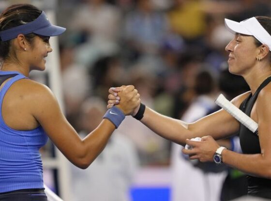 Jessica Pegula shakes hands with Emma Raducanu after their China Open match