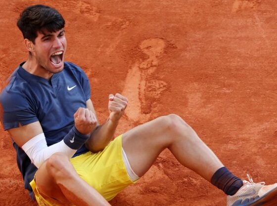 Carlos Alcaraz of Spain celebrates winning match point against Alexander Zverev of Germany during the Men's Singles Final match on Day 15 of the 2024 French Open at Roland Garros on June 09, 2024 in Paris, France. (Photo by Clive Brunskill/Getty Images)