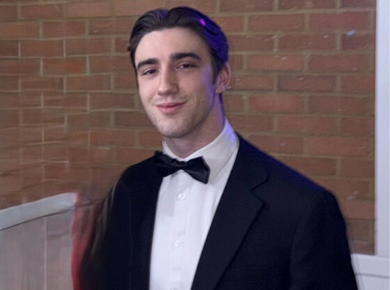 Harrison Edward Nada Konononunas in a Tuxedo.