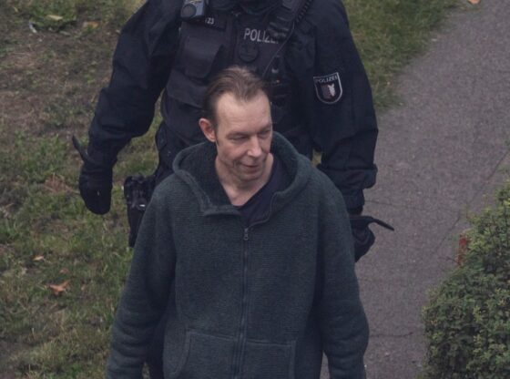 Christian Brueckner, the Maddie McCann suspect, being led away by police.
