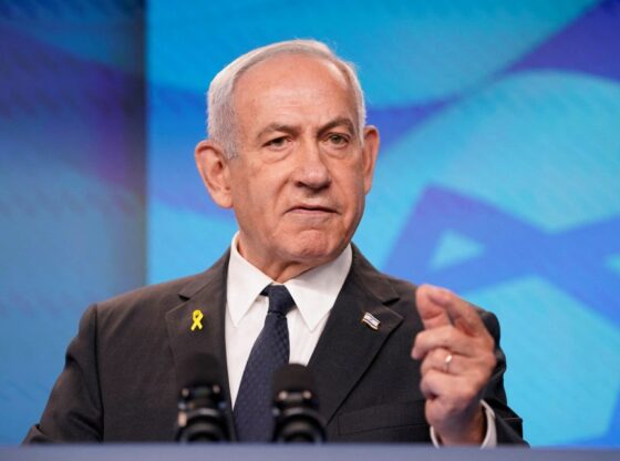 Israeli Prime Minister Benjamin Netanyahu gestures during a press conference.