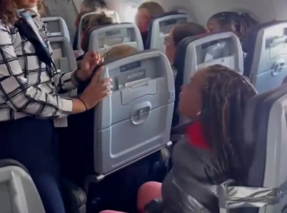 A passenger taped to her seat for allegedly attacking the crew on a flight to Las Vegas.