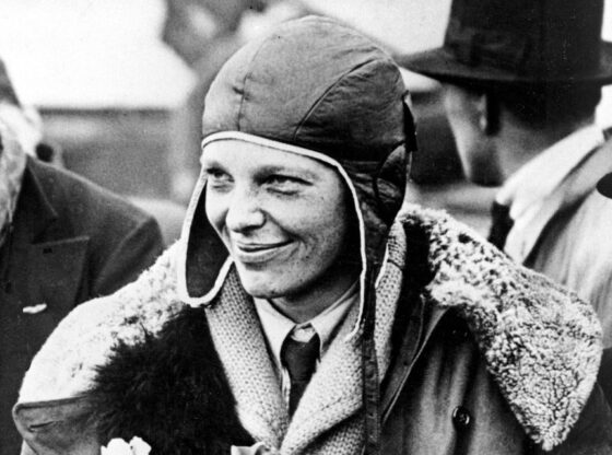 Amelia Earhart poses for photos after her transatlantic flight.