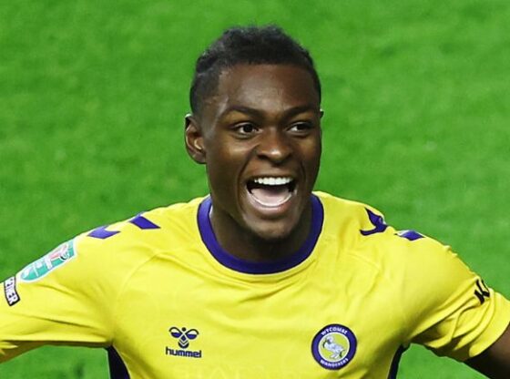 Donnel McNeilly of Wycombe Wanderers celebrates scoring his team's second goal in the win at Wigan