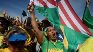 Supporters of former Brazilian President Jair Bolsonaro attend a demonstration against the Brazilian Supreme Court's actions in the trial against Bolsonaro, in Copacabana, Rio de Janeiro, Brazil, on August 3, 2025.