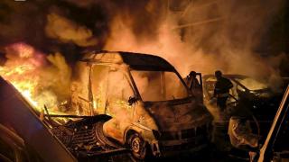 Firefighters work at the facilities of a company affected by Russian drones and missile attacks.