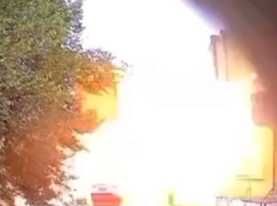 A car explosion on a street in Kherson.