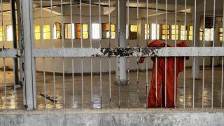 An orange prisoner's jumpsuit hangs from the bars of Sednaya, the 'human slaughterhouse' liberated by the rebels on December 8, after half a century of Assad tyranny.