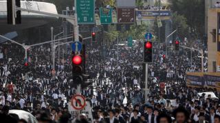 Thousands of ultra-Orthodox blockade Jerusalem against compulsory military service.