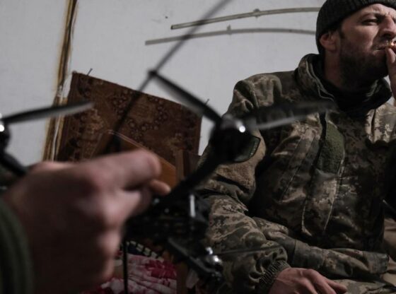 Ukrainian soldiers from the 68 Brigade prepare FPV attack drones for a mission from their combat position, inside Pokrovsk.