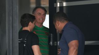 The former president of Brazil, Jair Bolsonaro, at the door of his house during his house arrest in November.