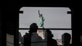 The Statue of Liberty is seen from the Staten Island Ferry in New York City.