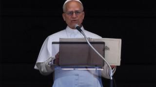 Pope Leo XIV leads the Regina Caeli prayer from his window in St. Peter's Square in the Vatican.